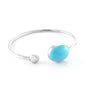 Xtinctio Stretch Bangle comfortable, timeless and chic Hand made in Italy by a 3rd generation Goldsmith Triple dipped Palladium and enamel Imbued with the spirit of the animal it represents and serving as a constant reminder that in this age of extinction, we are all connected to every living thing Imbued with the spirit of the Ocean