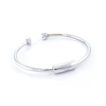 Xtinctio -Xtinctio Bracelet Made in Italy Recycled Sterling silver Love XX bracelet eco conscious, chic and comfortable representing your commitment to protecting these critically endangered species and their habitats   An  X  at each end of the bangle and bead with the  word Love debossed  on it.