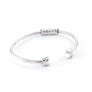 Xtinctio Bracelet Made in Italy Recycled Sterling silver Love XX bracelet eco conscious, chic and comfortable representing your commitment to protecting these critically endangered species and their habitats   An  X  at each end of the bangle and bead with the  word Love debossed  on it.
