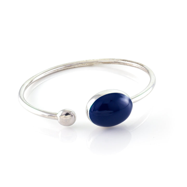 Xtinctio - Flexible Bangle timeless, comfortable and chic Hand made in Italy by a 3rd generation Goldsmith eco conscious with triple dipped platinum and  enamel.  Imbued with the spirit of our endangered Sea Mammals/ Whale  Xtinctio - Bangle Hand made in Italy eco conscious,  925 Sterling  Silver with triple dipped platinum and enamel. Imbued with the spirit of our endangered Sea Mammals, in particular the whale