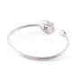 Xtinctio Stretch Bangle comfortable, timeless and chic Hand made in Italy by a 3rd generation Goldsmith   Triple dipped Palladium and enamel   Imbued with the spirit of the animal it represents and serving as a constant reminder that in this age of extinction, we are all connected to every living thing Imbued with the spirit of the endangered Orangutan