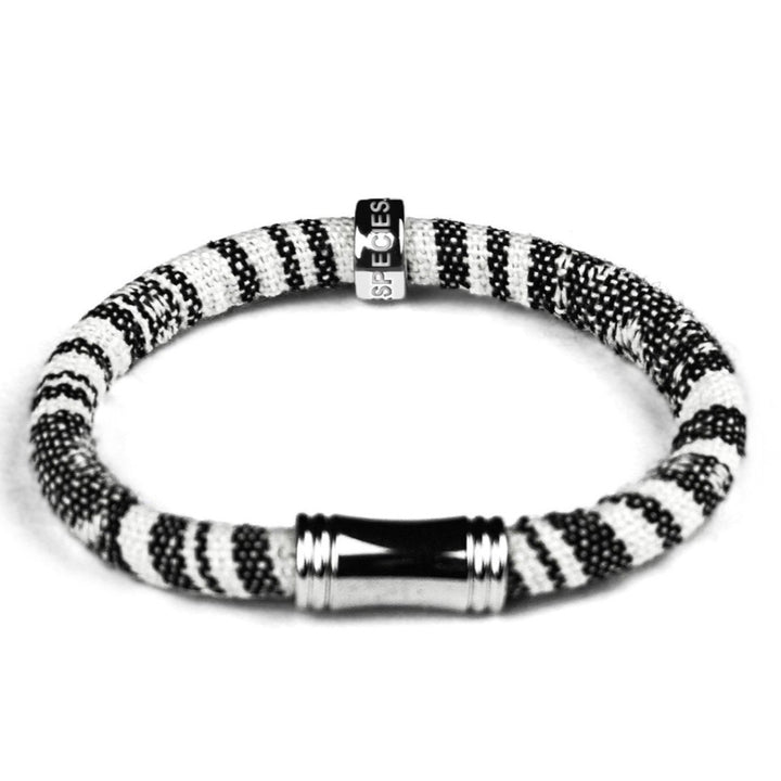 Highly Durable, Comfortable, Fun and well made . Eco-conscious linen/cotton blend RHINO HOPE bracelet is hand made.  Easy on, easy off magnetic clasp. Each color represents White and Black Rhino species