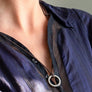 Xtinctio - necklace Amulet individually hand forged in Italy from White Bronze and white Etruscan Enamel in honor of the endangered Polar Bear.  Eco friendly cotton linen blend waxed cord sourced in Italy.