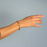 Xtinctio Bracelet Made in Italy Recycled Sterling silver Love XX bracelet eco conscious, chic and comfortable representing your commitment to protecting these critically endangered species and their habitats   An  X  at each end of the bangle and bead with the  word Love debossed  on it.