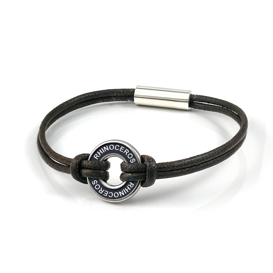 Xtinctio Bracelet - Individually hand forged in Italy from White Bronze and black Etruscan Enamel in honor of the critically endangered Rhino.  Eco friendly cotton linen blend waxed cord sourced in Italy