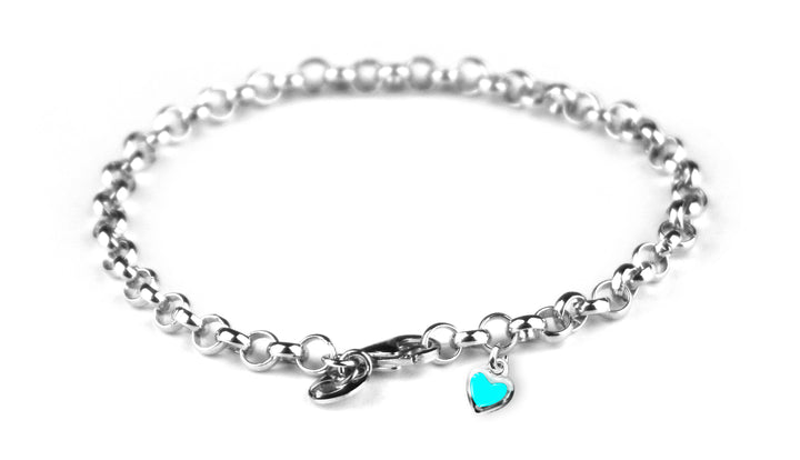 925 Sterling silver Turquoise Heart charm bracelet representing your commitment to protecting these critically endangered species and their habitats. 50% of all profits are donated to organizations that protect endangered species and their habitats.  