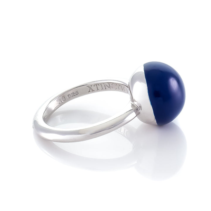 Xtinctio - This Etruscan Sphere Ring is hand made in Italy by a 3rd generation goldsmith using 925 Silver and enamel.  Engraved with our X logo, it is a positive reminder of our connection to every living thing in this age of extinction.  Our partner in Ocean